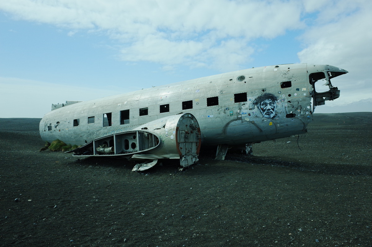 Port side view of a crashed C-117D plane in Iceland.