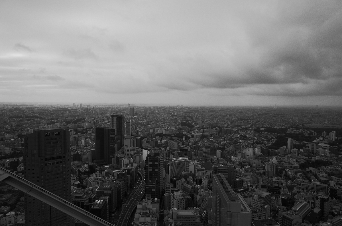 A wide landscape view of the city of Shibuya.