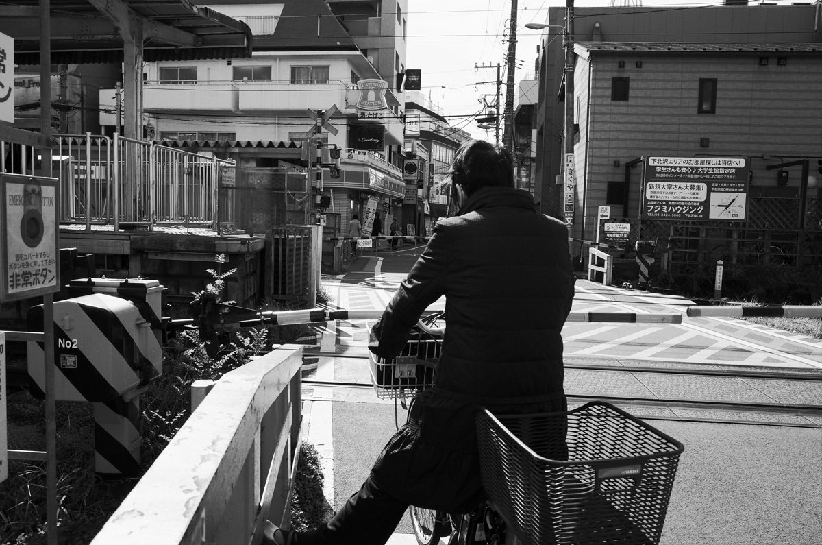 Man on a bicycle in Shimokitazawa.